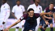 Paris Saint-Germain's Uruguayan forward Edinson Cavani celebrates after scoring a goal during the French L1 football match between Paris Saint-Germain (PSG) and Nice (OGC Nice) on October 27, 2017, at the Parc des Princes stadium in Paris. / AFP / FRANCK 