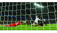 Tottenham’s Dele Alli scores their first goal against Real Madrid during the Champions League match against Real Madrid at the Wembley Stadium in London yesterday.