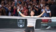 Serbia's Filip Krajinovic celebrates winning against USA's John Isner during the semi-final round at the ATP World Tour Masters 1000 indoor tennis tournament on November 4, 2017 in Paris. Krajinovic won the match 6-4, 6-7 and 7-6 and qualified for the fin