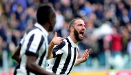 Juventus’ Gonzalo Higuain celebrates scoring their first goal REUTERS/Massimo Pinca
