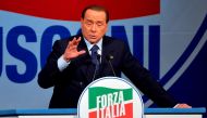 (FILES) This file photo taken on May 22, 2014 shows Former Italian Prime Minister and president of the Italian center-right Forza Italia (FI) party, Silvio Berlusconi during a rally.   AFP / Andreas SOLARO
