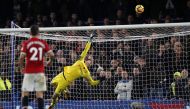 Chelsea's Belgian goalkeeper Thibaut Courtois watches a late freekick go over during the English Premier League football match between Chelsea and Manchester United at Stamford Bridge in London on November 5, 2017.  AFP / Adrian DENNIS