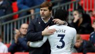 Tottenham's Danny Rose with manager Mauricio Pochettino as he is substituted REUTERS/Peter Nicholls