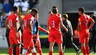 Peru's players react after a draw during the World Cup football qualifying match between New Zealand and Peru at Westpac Stadium in Wellington on November 11, 2017. / AFP / Marty MELVILLE
