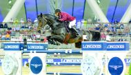 Qatari rider Bassem Mohammed guides Gunder over an obstacle during the final day of the Qatar Round of Longines Global Champions Tour at Al Shaqab Arena yesterday. Pictures: Lotfi Garsi