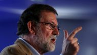 Spanish Prime Minister Mariano Rajoy gestures during a Catalan regional People's Party meeting in Barcelona, Spain, November 12, 2017. REUTERS/Albert Gea