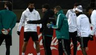 Germany's head coach Joachim Loew (C) takes part in the training session ahead of the friendly match against France at the Suedstadion on November 12, 2017 in Cologne, Germany. / AFP / PATRIK STOLLARZ