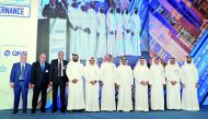 H E Sheikh Abdulla bin Saud Al Thani (fifth right), Governor at Qatar Central Bank; Sheikh Fahad bin Faisal bin Thani Al Thani (fourth right), the Deputy Governor at Qatar Central Bank;  Ali Ahmed Al Kuwari (fifth left), CEO, Qatar National Bank;  Abdul R