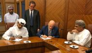 President and CEO of Qatar Petroleum Saad Sherida Al Kaabi signing the agreement