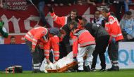 (FILES) This file photo taken on September 16, 2017 shows Stuttgart's German midfielder Christian Gentner being stretchered off during the German first division Bundesliga football match VfB Stuttgart v VfL Wolfsburg in Stuttgart, southern Germany. Stuttg