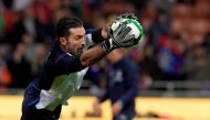 Italy's goalkeeper Gianluigi Buffon warms up prior the FIFA World Cup 2018 qualification football match between Italy and Sweden, on November 13, 2017 at the San Siro stadium in Milan. / AFP / Miguel MEDINA
