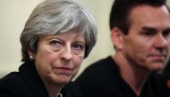 Britain's Prime Minister Theresa May gestures during an industry roundtable with leading figures from the tech sector hosted by herself and Britain's Chancellor of the Exchequer Philip Hammond at 10 Downing Street, London on November 15, 2017. / AFP / POO