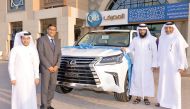 QIB’s card campaign grand prize winner of Lexus LX570, 2017. Salem Sheail (second right) with QIB officials.