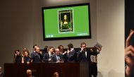 Christie's employees take bids for Leonardo da Vinci's 