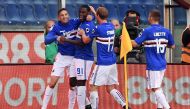 Sampdoria's forward Duvan Zapata from Colombia (2nd L) celebrates with teammates after scoring during the Italian Serie A football match Sampdoria Vs Juventus on November 19, 2017 at the 'Luigi Ferraris' Stadium in Genoa. / AFP / MARCO BERTORELLO
