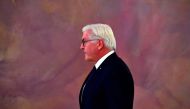 German President Frank-Walter Steinmeier leaves after addressing a press conference in Berlin on November 20, 2017, after coalition talks to form a new government failed overnight.  AFP / John MACDOUGALL
