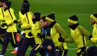 Tottenham Hotspur's players including English striker Harry Kane (C) warm up during a training session on the eve of the Champion's League Group H football match Borussia Dortmund against Tottenham Hotspur on November 20, 2017 in Dortmund, western Germany