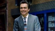 FILE PHOTO - David Cassidy poses for photographers outside the Phoenix theatre in London, October 23, 1995. REUTERS/Andrew Shaw/File Photo
