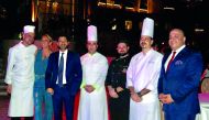 Italian Ambassador, Pasquale Salzano (third left), Chef Massimo Malantrucco (left), and Italian Chamber of Commerce in Qatar Founder and Chairperson, Palma Libotte (second left),  along with chefs and officials from Marsa Malaz Kempinski and Antica Pesa R