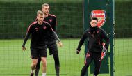 Arsenal's Mesut Ozil, Per Mertesacker and Rob Holding during training Action Images via Reuters/Tony O'Brien
