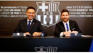 Barcelona's Argentine superstar Lionel Messi poses with FC Barcelona president Josep Maria Bartomeu during the signing of his new contract in Barcelona, Spain, November 25, 2017. German Parga/FC Barcelona