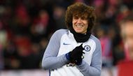 Chelsea's Brazilian defender David Luiz warms up on the pitch ahead of the English Premier League football match between Liverpool and Chelsea at Anfield in Liverpool, north west England on November 25, 2017.  AFP / Paul ELLIS 