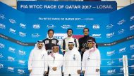 Podium winners of Race 2 in the opening round of the Qatar Touring Car Championship (QTTC), Saadon Al Kuwari (top left), Abdulla Ali Al Khelaifi (top centre) and Adham Maged Eldib pose for a photograph with QMMF President Abdulrehman Al Mannai (third left