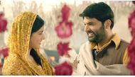 A still of the actors Kapil Sharma and Ishita Dutta from the movie Firangi.