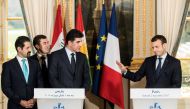 French President Emmanuel Macron (R), Kurdish region's Prime Minister Nechirvan Barzani and Iraqi Kurdistan’s Deputy Prime Minister Qubad Talabani (L) attend a press conference at the Elysee Palace following a meeting in Paris, France, December 2017. (REU