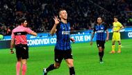 Inter Milan's Croatian forward Ivan Perisic celebrates after scoring during the Italian Serie A football match Inter Milan vs Chievo on December 3, 2017 at the San Siro stadium in Milan. / AFP / MIGUEL MEDINA
