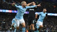 West Ham United's Argentinian defender Pablo Zabaleta (C) reacts as Manchester City's Spanish midfielder David Silva (L) celebrates scoring their second goal during the English Premier League football match between Manchester City and West Ham United at t