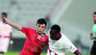 Players vie for the ball possession during the QNB Stars League match between Al Duhail and Al Markhiya which was played at Abdulla bin Khalifa Stadium on Saturday. Al Duhail won the match 2-1 but Al Duhail coach Belmadi praised the losing side for their 