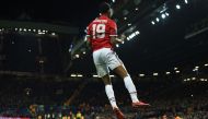  Manchester United's English striker Marcus Rashford celebrates after scoring their second goal during the UEFA Champions League Group A football match between Manchester United and CSKA Moscow at Old Trafford in Manchester, north west England on December