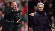 Manchester City's Spanish manager Pep Guardiola (L) and Manchester United's Portuguese manager Jose Mourinho