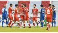 Al Arabi’s Gaser Zakaria (centre) celebrates with team-mates after scoring their first goal against Al Khor during the QNB Stars League match played at Al Arabi Stadium yesterday.