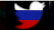 A 3D-printed Twitter logo displayed in front of Russian flag is seen in this illustration picture, October 27, 2017. REUTERS/Dado Ruvic/Illustration