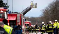 Firefighters are seen at the site of Austria's main gas pipeline hub at Baumgarten an der March, Eastern Vienna, after an explosion rocked the site on December 12, 2017. AFP / JOE KLAMAR
