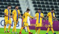 Al Gharafa players celebrate after scoring a goal against Umm Salal yesterday.