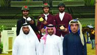 The podium winners of Medium Tour - Art. 238.2.2, 120/130 cm event of the fourth leg of Hathab Series, Hamad Nasser Al Qadi (top centre), Hussain Said Haidan and Mubarak Yousuf Al Rumaihi pose for a photograph with Omar Al Mannai, Commercial Manager of Al