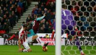 Stoke City's Erik Pieters fouls West Ham United's Manuel Lanzini and referee Graham Scott consequently awards a penalty REUTERS/Andrew Yates 

