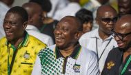 Cyril Ramaphosa, the newly elected leader of South Africa’s ruling African National Congress, arrives at the party's national conference on Tuesday in Johannesburg. PHOTO: MUJAHID SAFODIEN/AGENCE FRANCE-PRESSE.