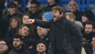 An image of Chelsea's Italian head coach Antonio Conte gesturing during the English League Cup quarter-final football match between Chelsea and Bournemouth at Stamford Bridge Stadium, December 20, 2017. / AFP / Glyn KIRK  