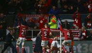 Bristol City's English midfielder Korey Smith celebrates with teammates scoring the second goal during the English League Cup quarter-final football match between Bristol City and Manchester United at Ashton Gate Stadium in Bristol, southwest England on D