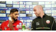 Qatar captain Hassan Al Haydos (left) and coach Felix Sanchez speak during a press conference on the eve of their Gulf Cup match against Yemen in Kuwait yesterday. 