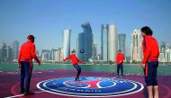 From left: PSG’s Kylian Mbappe, Neymar Jr, Thiago Silva and Edinson Cavani during a game on a floating football pitch on Friday at Corniche.