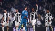 Juventus' defender Medhi Amine Benatia from Morocco (2-R) and Juventus' goalkeeper Wojciech Szczesny from Poland (3-L) react following the Italian Serie A football match Juventus versus AS Roma on December 23, 2017 at the Allianz Stadium in Turin. / AFP /