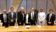 Tim Gibson (third left), Fujitsu’s VP Defence and National Security; Ghada Phillip El Rassi (centre), MEEZA’S CEO Expansion; Mitchell Scherr (third right), Vauban’s Chief Executive; and Ahmad Mohammed Al  Kuwari (second right), Chief Executive Officer, ME