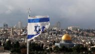 An Israeli flag is seen near the Dome of the Rock, located in Jerusalem's Old City on the compound known to Muslims as Noble Sanctuary and to Jews as Temple Mount December 6, 2017. REUTERS/Ammar Awad/File Photo