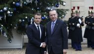President of Turkey, Recep Tayyip Erdogan (R) is welcomed by President of France, Emmanuel Macron (L) during an official ceremony at Elysee Palace on January 05, 2018. (Murat Kula/ Anadolu Agency)