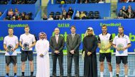 Qatar Tennis Federation (QTF) President Nasser Al Khelaifi (third right) and other officials pose for a photograph with Men’s doubles winners of the  Qatar ExxonMobil Open, M. Pavi? and O. Marach at the Khalifa International Tennis and Squash Complex in D